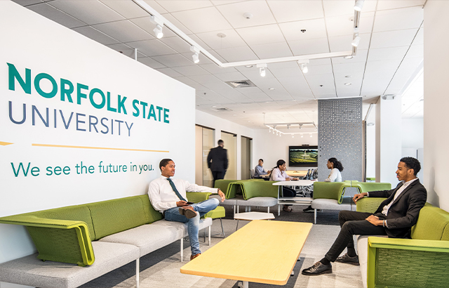 NSU Innovation Center Stock Photo - students sitting on in an office talking