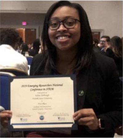 nsu student Kelsea Yabrough holding a Stem certificate