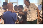 A doctor examining a child