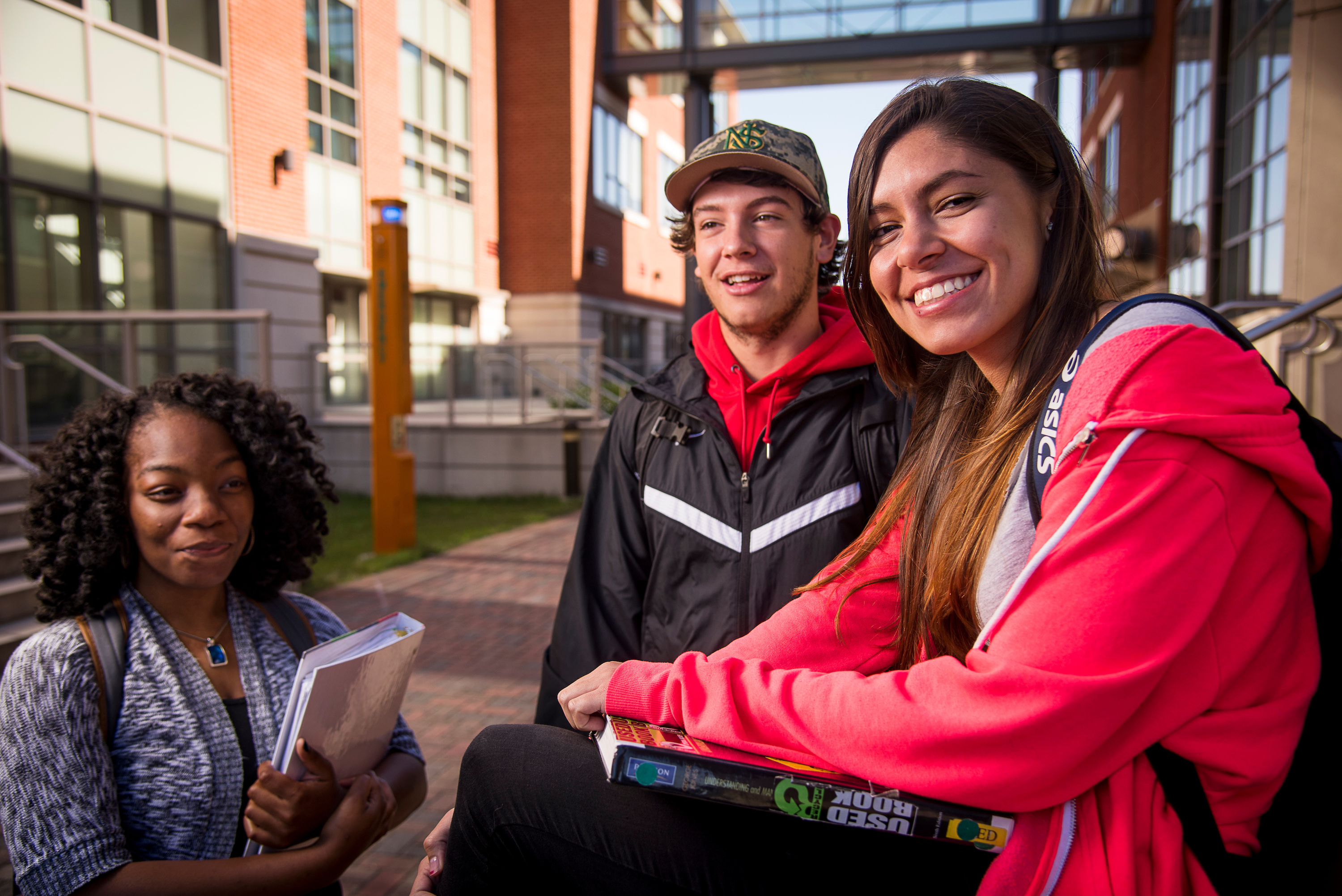 students talking outside of the student center