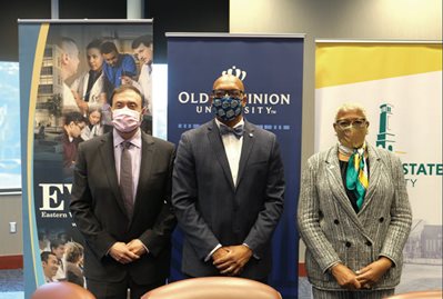 three university presidents standing