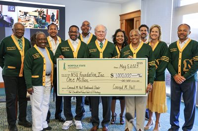 BOV members, including Conrad Hall and NSU President Adams-Gaston present $1M check to NSU Foundation.