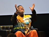 Dylan Pritchett, a storyteller with Arts for Learning Virginia, presenting "Essential African Threads."