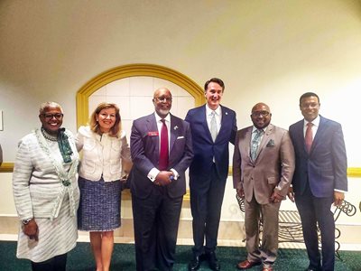 Gov. Youngkin with iginataries that spoke at the event.