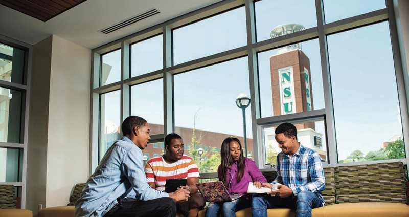 students sitting in the NGE building